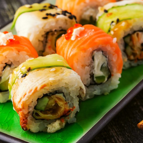 Sushi set: sushi roll with salmon and sushi roll with smoked eel